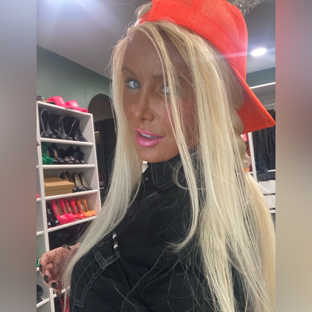 NEON ORANGE TRUCKER HAT. Beautiful way to save a bad hair day.